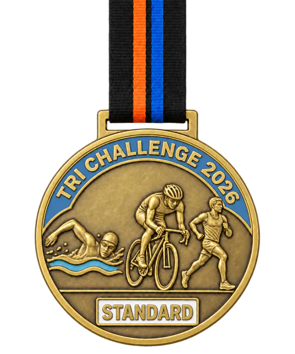 Triathlon medal TRI CHALLENGE 2026 with a steel blue enamel band and a STANDARD plate, a swimmer, a cyclist and a runner in relief