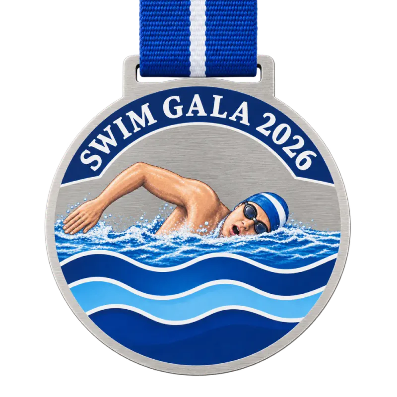 Printed steel swimming medal: a swimmer and water printed in full colour with blue gradients on brushed steel, text SWIM GALA 2026