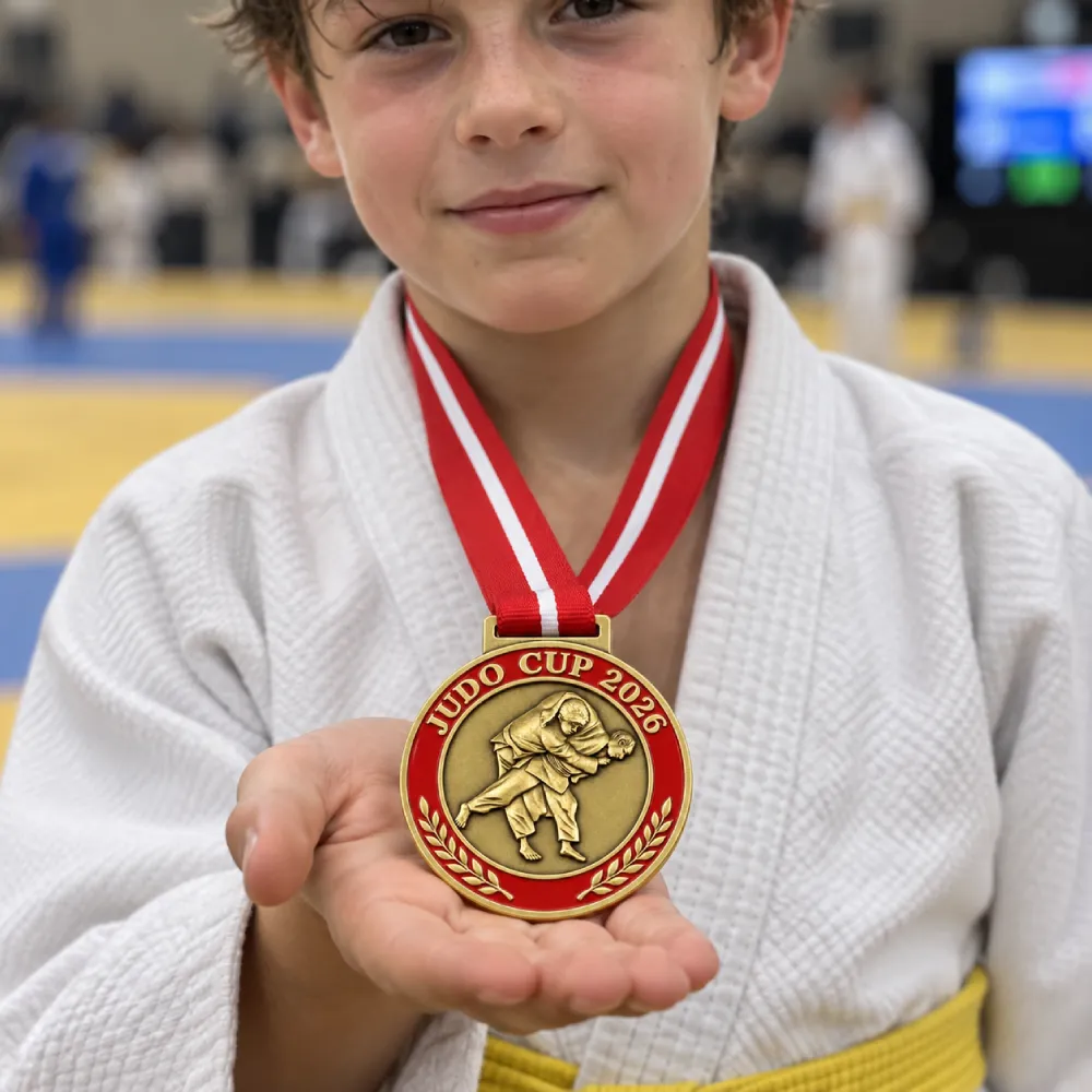 Judo cup — the throw in relief — worn at the event