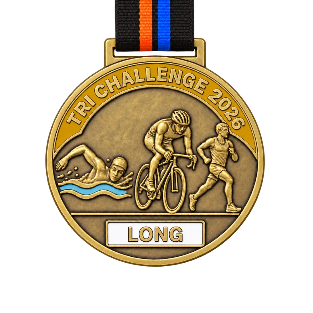 Cast triathlon medal in antique gold: swimmer, cyclist and runner in one relief above a white enamel plate reading LONG